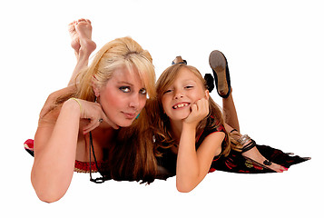 Image showing Daughter and mom lying.