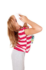 Image showing Girl with tissue on her nose.