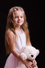 Image showing Five-year girl with a teddy bear