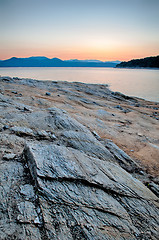 Image showing Beautiful Mountain Lake Shoreline on a sunny Day