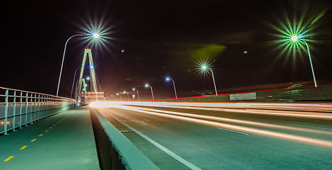 Image showing traffic commute on bridge at night long exposure