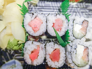 Image showing sushi with salmon and avocado rolls