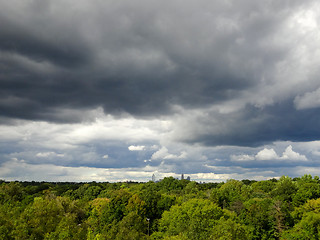 Image showing Dark ominous grey storm clouds