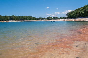 Image showing Beautiful Mountain Lake Shoreline on a sunny Day