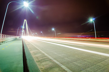 Image showing traffic commute on bridge at night long exposure