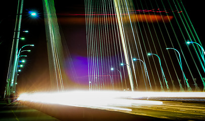 Image showing Traffic on the bridge in the evening.