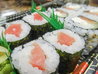 Image showing sushi with salmon and avocado rolls