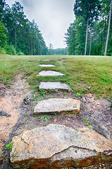 Image showing stone step stair leads to an open golf course