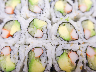 Image showing sushi with salmon and avocado rolls