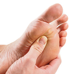 Image showing Male person receiving podiatry with pressure point technique und