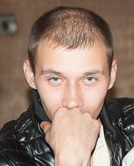 Image showing Young man with a serious and thoughtful look