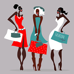 Image showing Fashion girls. Women with shopping bags.
