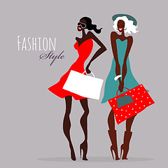 Image showing Fashion girls. Women with shopping bags.