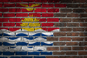 Image showing Brick wall texture with flag