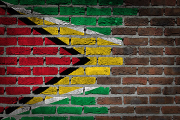 Image showing Brick wall texture with flag