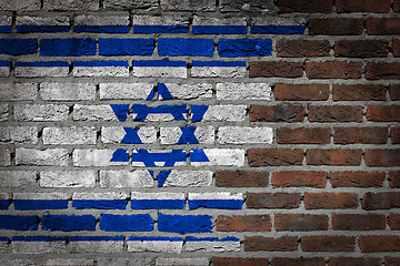 Image showing Brick wall texture with flag