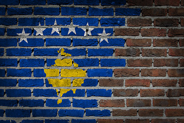 Image showing Brick wall texture with flag