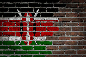 Image showing Brick wall texture with flag