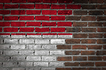 Image showing Brick wall texture with flag