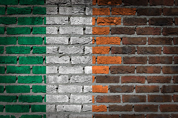 Image showing Brick wall texture with flag