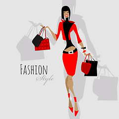 Image showing Fashion girl. Woman with shopping bags.