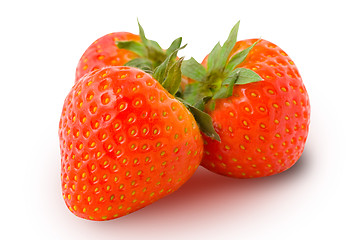 Image showing Three ripe strawberries isolated