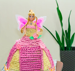 Image showing A cake in the form of a beautiful doll.