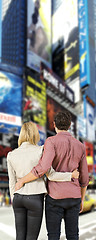 Image showing Couple looking at billboards