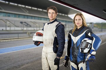 Image showing Drivers in the pit lane