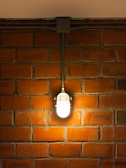 Image showing Old brick wall with industrial light