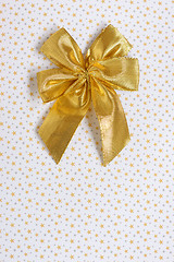 Image showing gold gift bow isolated