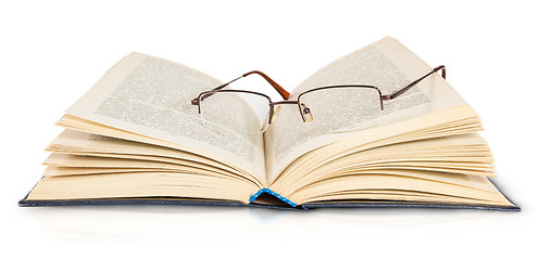 Image showing Opened Book And Glasses