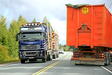 Image showing Volvo FH16 Logging Truck and a Trailer Truck on the Road