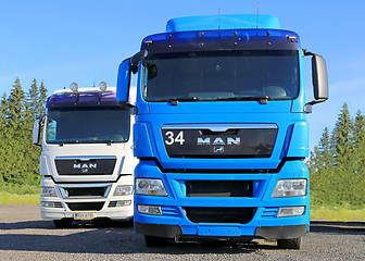 Image showing White and Blue MAN Truck Tractors