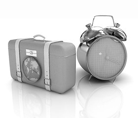 Image showing Suitcases for travel and clock