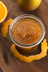 Image showing glass of pear jam with orange