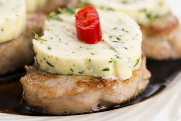 Image showing steak with herbs butter