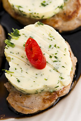 Image showing steak with herbs butter