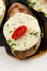 Image showing steak with herbs butter