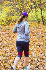 Image showing Female jogger in   park