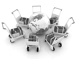 Image showing Trolley for luggage at the airport and earth. International tour