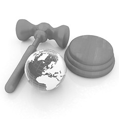 Image showing Wooden gavel and earth isolated on white background. Global auct