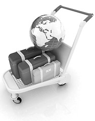 Image showing Trolley for luggage at the airport and earth. International tour