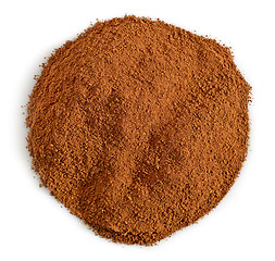 Image showing round cinnamon powder