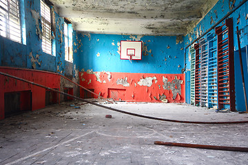 Image showing old sports hall at school with a basketball