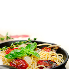 Image showing spaghetti pasta with baked cherry tomatoes and basil 