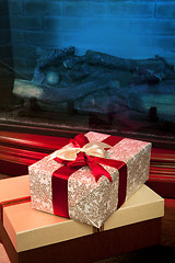 Image showing Christmas gift box with red ribbon