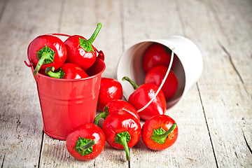 Image showing red hot chilli peppers in little buckets