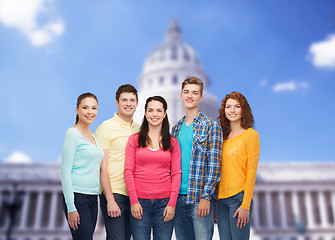 Image showing group of smiling teenagers showing ok sign