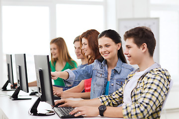 Image showing male student with classmates in computer class